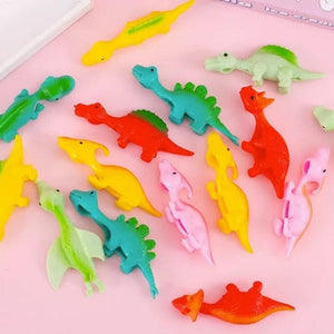 Jouets de doigt de dinosaure de fronde(10 pièces, couleurs aléatoires)